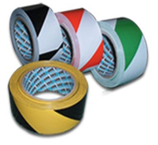 Rolls of PVC floor tape in various colors including black and white with a chevron pattern, used for marking floors.